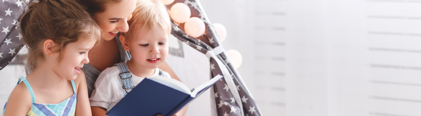 woman reading to children