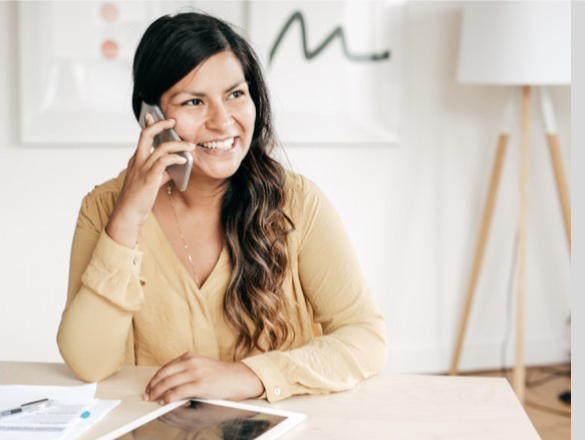 Woman smiling while on the phone